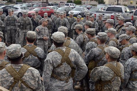 A photo of soldiers laughing and joking together