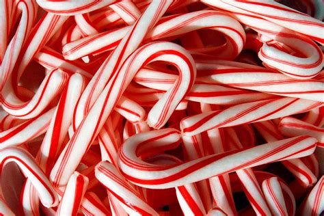 Candy canes in a decorative bowl