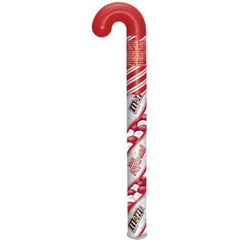 A candy cane decorating a Christmas tree