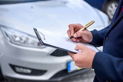 Inspecting the car for any damage or issues