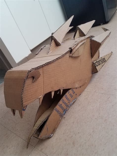 Cardboard dragon head template with a medieval and fantasy design