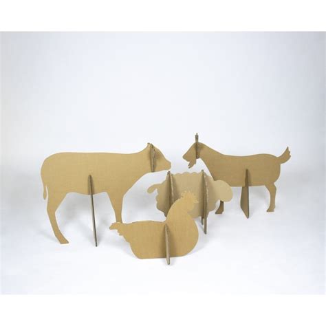 A collection of cardboard farm animal templates, including a cow, pig, and sheep