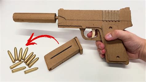 A cardboard pistol model kit