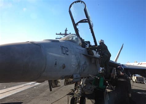 CVW-5 personnel conduct a training exercise on the flight deck of USS Ronald Reagan (CVN 76)