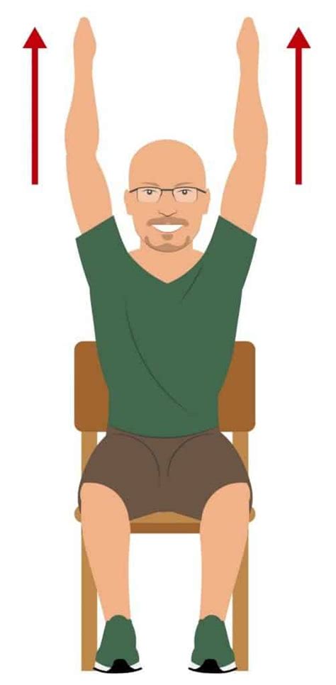 Senior doing chair arm raises exercise