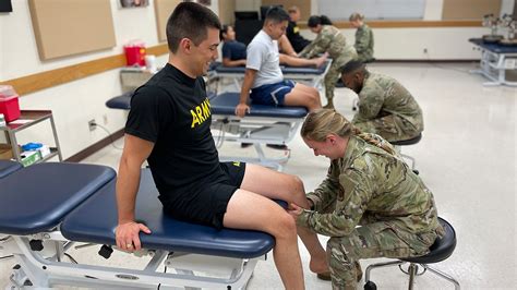 Occupational therapist working with a military member