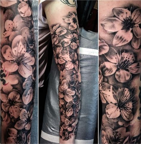 Cherry blossom sleeve tattoo