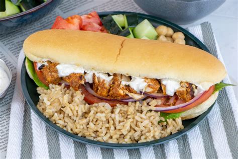 A Chicken Shawarma sub sandwich, featuring marinated chicken and tzatziki sauce