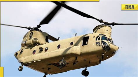 A Chinook helicopter transporting heavy equipment