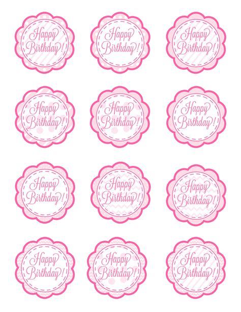 Christening cupcake topper templates on a desk