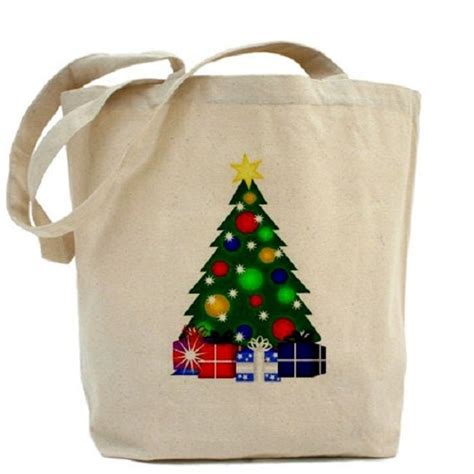 Christmas canvas bags with holly leaves and red ribbons