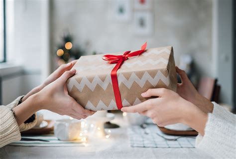 A family exchanging Christmas gifts