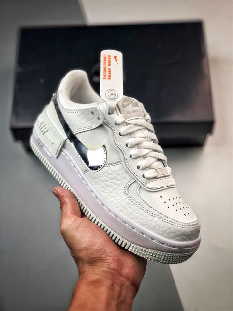 Chrome Air Force 1s with bold accents