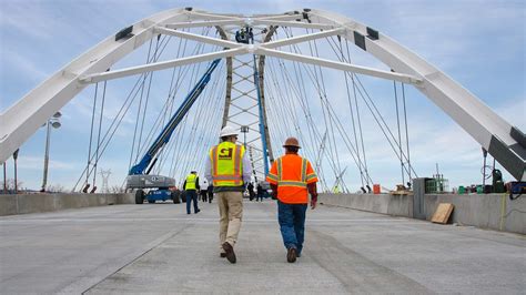 Civil engineers designing bridges