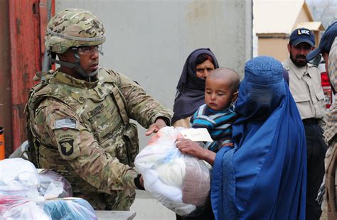 Military officers engaging with civilians