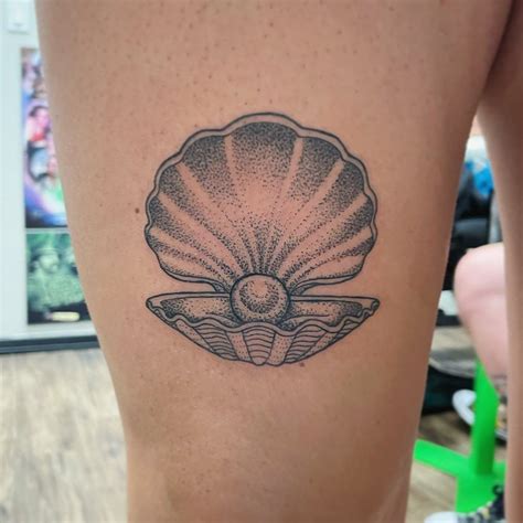 Clam shell tattoo