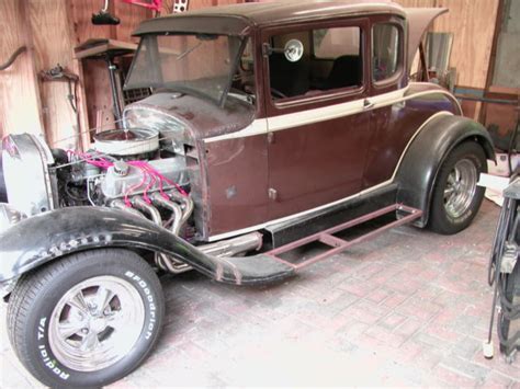 A classic hot rod on the open road