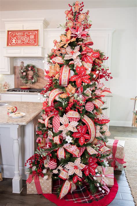 Classic red and white Christmas tree decorated with gold ornaments and lights