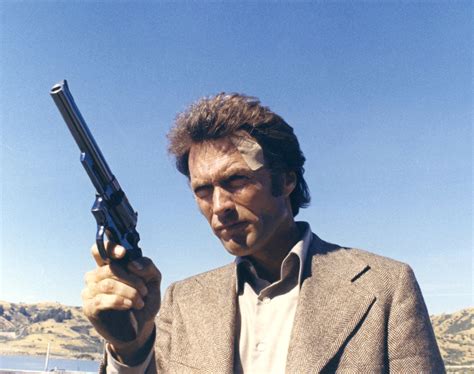 Clint Eastwood holding his.44 Magnum