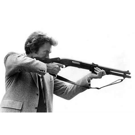 Clint Eastwood with a shotgun