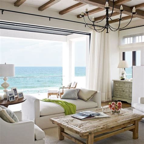 A coastal-inspired living room featuring a soothing color palette and ocean-inspired wall art.