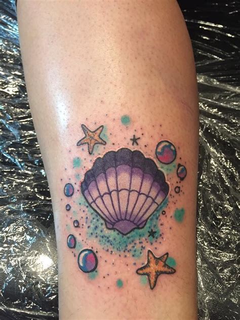 Colorful beach shell tattoo