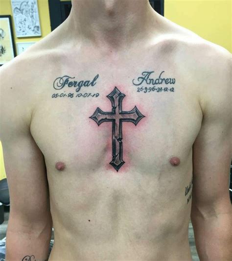 Colorful cross chest tattoos