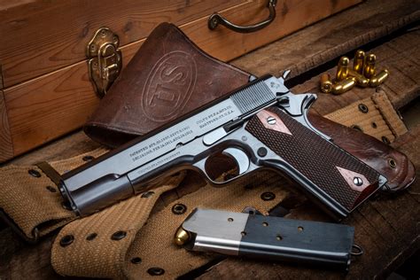 A Colt 1911 pistol on display at a museum