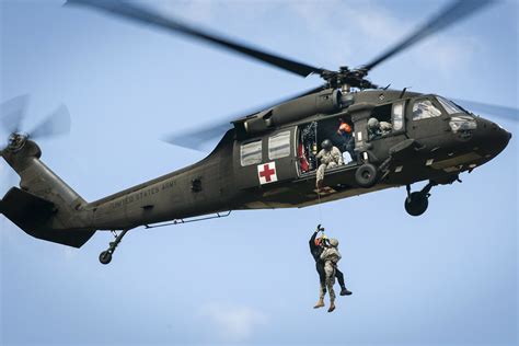 Combat medics in a helicopter