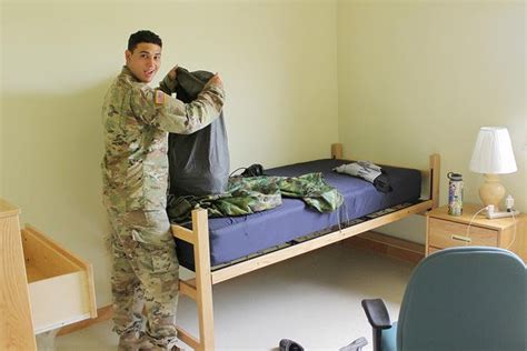 A comfortable chair in a barracks room