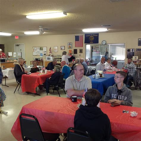 Community center volunteers serving breakfast