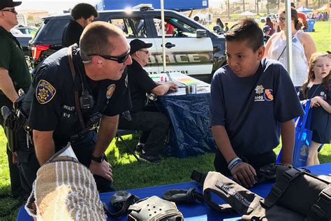 Community service officers engaging in outreach efforts