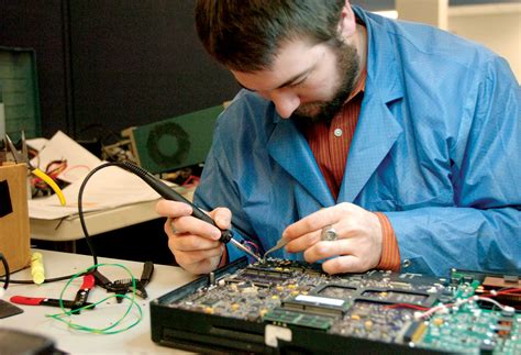 An image of a computer hardware engineer working on a project