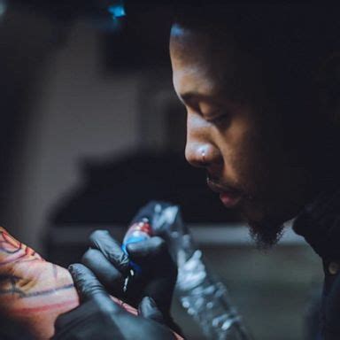 Contemporary black tattoo artists at work