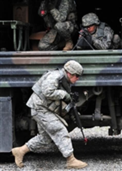 Soldiers participating in a convoy operations training exercise at Fort Irwin