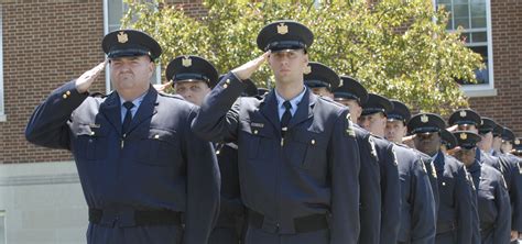 A Correctional Officer supervising inmates during recreational activities