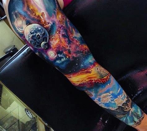 Cosmic arm sleeve tattoos with stars and galaxies