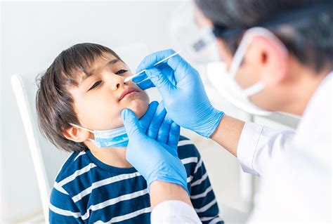 A child undergoing COVID testing