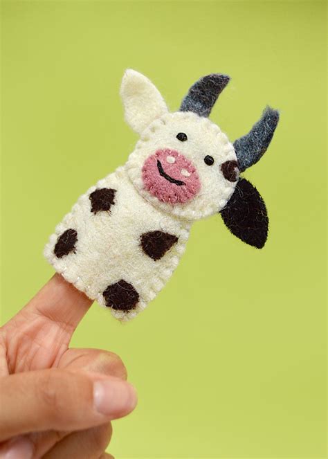 Cow finger puppet