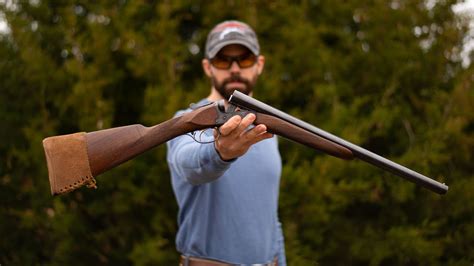 Cowboy firing shotgun