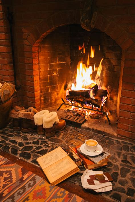 Family cozying up by the fireplace for a holiday portrait