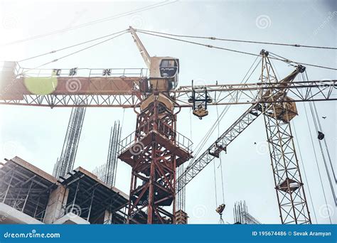 A crane lifting a heavy load on a construction site