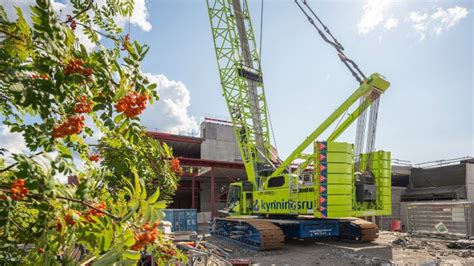 A crane lifting heavy materials on a construction site