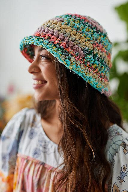 Crochet bucket hat in a vibrant pink color