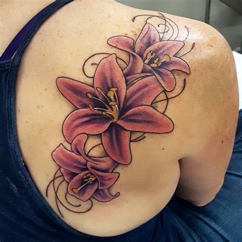 Cross lily tattoo design