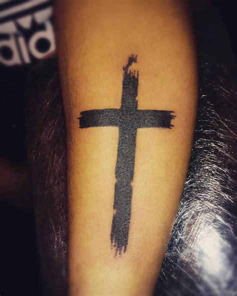 Description of Cross Tattoo Art