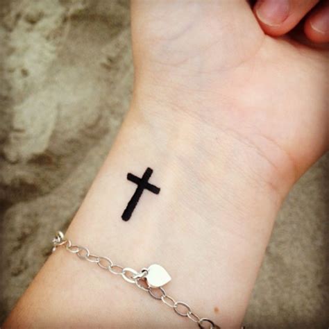 Cross tattoo placement