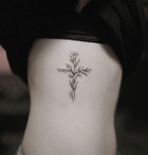 The cross with lily tattoo meaning