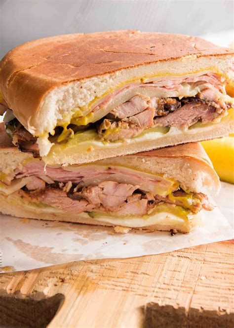 A Cubano sub sandwich, featuring ham, roasted pork, and Swiss cheese