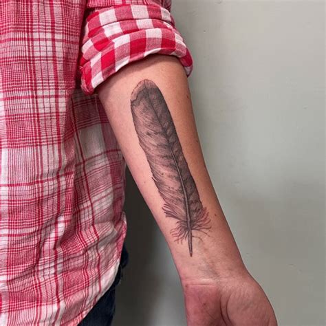 cultural significance of feather tattoos